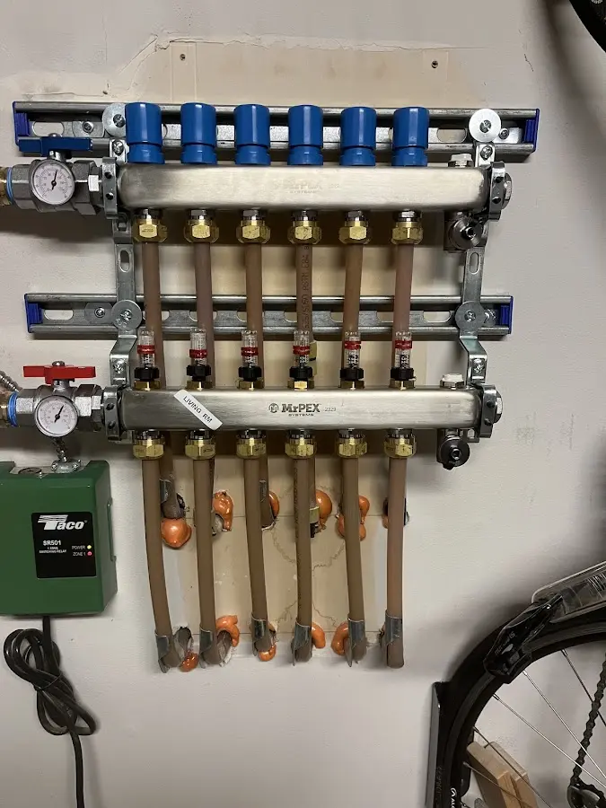 Plumber performing Leak Detection at a residential property in Epsom